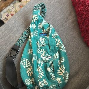 Teal and tan pineapple kavu backpack